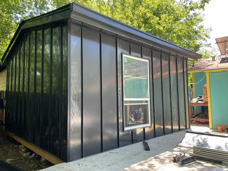 Black standing seam metal wall panels for Roof Inspection in Placentia